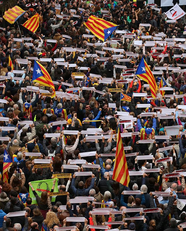 Protesters gather in Sant Jaume square at a demonstration during a partial regional strike in Barcelona