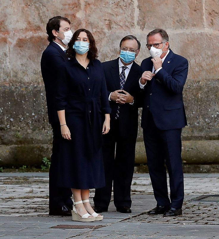 Los presidentes de Madrid, Isabel Díaz Ayuso, Castilla y León, Alfonso Fernández Mañueco, Ceuta, Juan Vivas y Melilla, Eduardo de Castro (i a d), conversan a su llegada a San Millán de la Cogolla, este viernes, para asistir a la conferencia