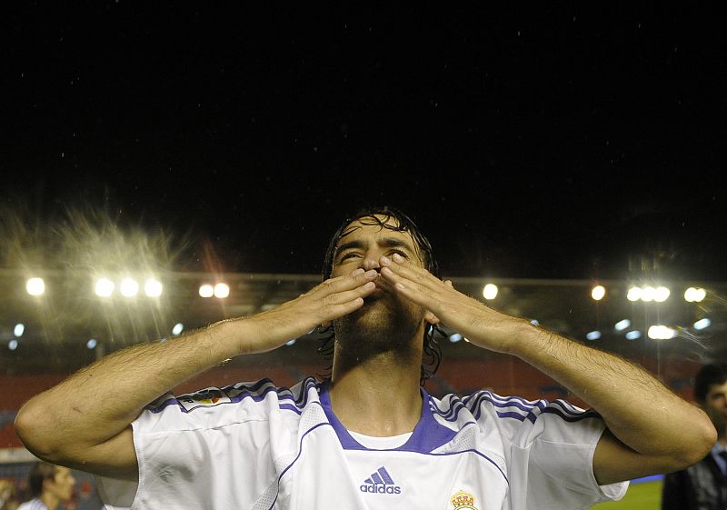 Real Madrid's Raul celebrate winning Spanish First Division soccer league title after defeating Osasuna in Pamplona