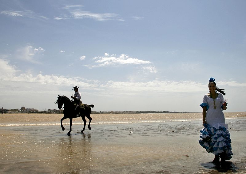 Pilgrims make their way to the shrine of El Rocio in Sanlucar de Barrameda