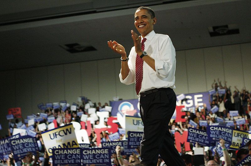 Democratic presidential candidate Senator Barack Obama takes the stage before addressing his supporters during a campaign stop in Louisville