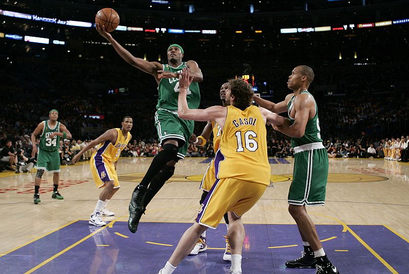 Celtics Posey goes high to shoot as Lakers Gasol defends during Game 4 of the NBA Finals basketball championship in Los Angeles