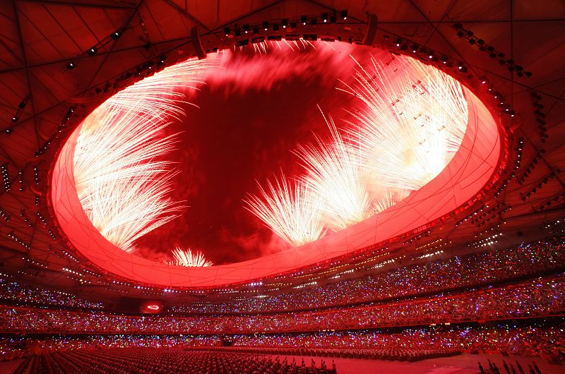 Fireworks explode during the opening ceremony of the Beijing 2008 Olympic Games at the National Stadium