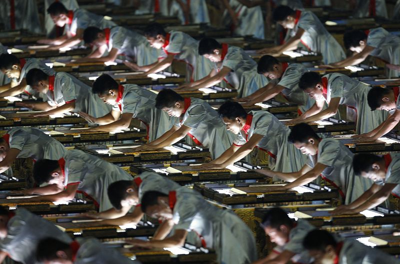 Actors perform at the opening ceremony of the Beijing 2008 Olympic Games at the National Stadium