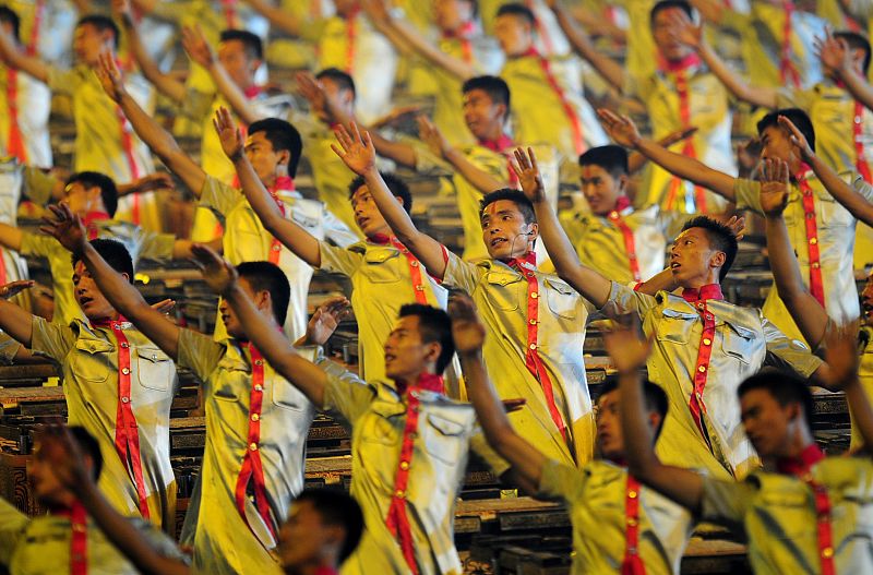 Performers take part in the opening ceremony of the Beijing 2008 Olympic Games at the National Stadium