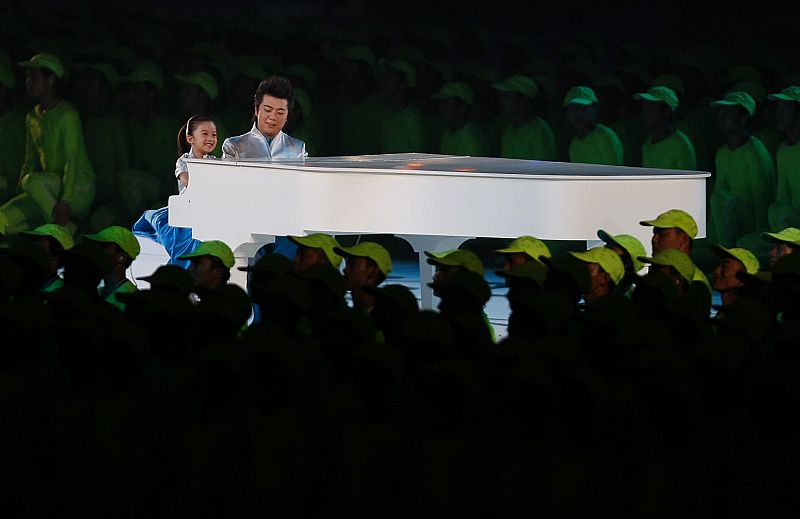 China's famous pianist Lang Lang performs during the opening ceremony of the Beijing 2008 Olympic Games at the National Stadium