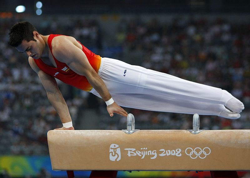 Ivan San Miguel of Spain competes in the men's qualification pommel horse during the artistic gymnastics competition at the Beijing 2008 Olympic Games