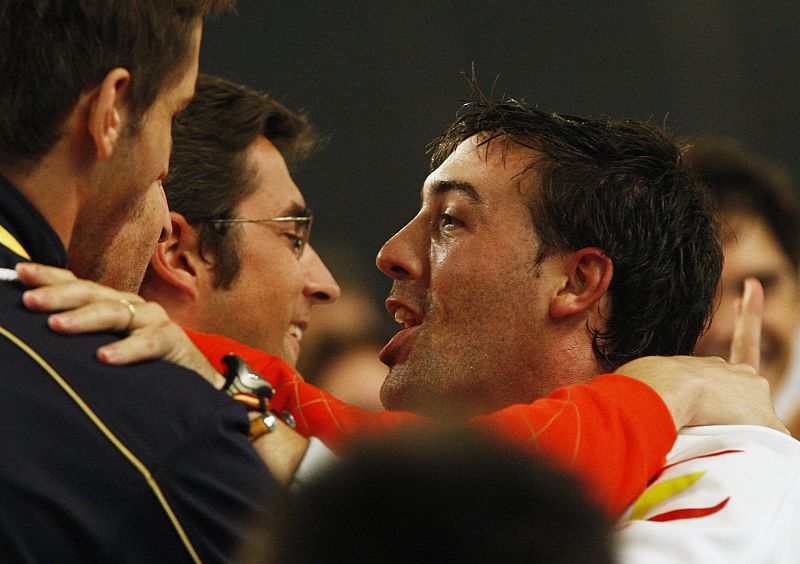 Abajo of Spain celebrates his victory against Confalonieri of Italy after their epee bout in the men's individual fencing competition at the Beijing 2008 Olympic Games