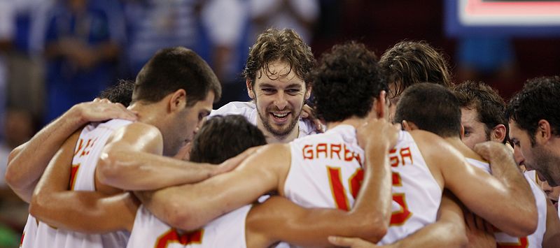 Pau Gasol of Spain and teammates celebrate victory against Greece in men's basketball game at Beijing 2008 Olympic Games