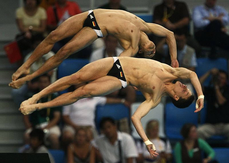 Hausding and Klein of Germany compete in the men's 10m platform synchronized diving final at the Beijing 2008 Olympic Games