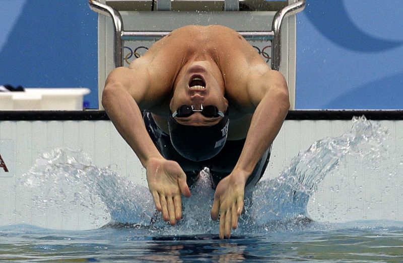 Aaron Peirsol of the U.S. comes off the wall on his way to winning the gold medal in the men's 100m backstroke swimming final at the Beijing 2008 Olympic Games