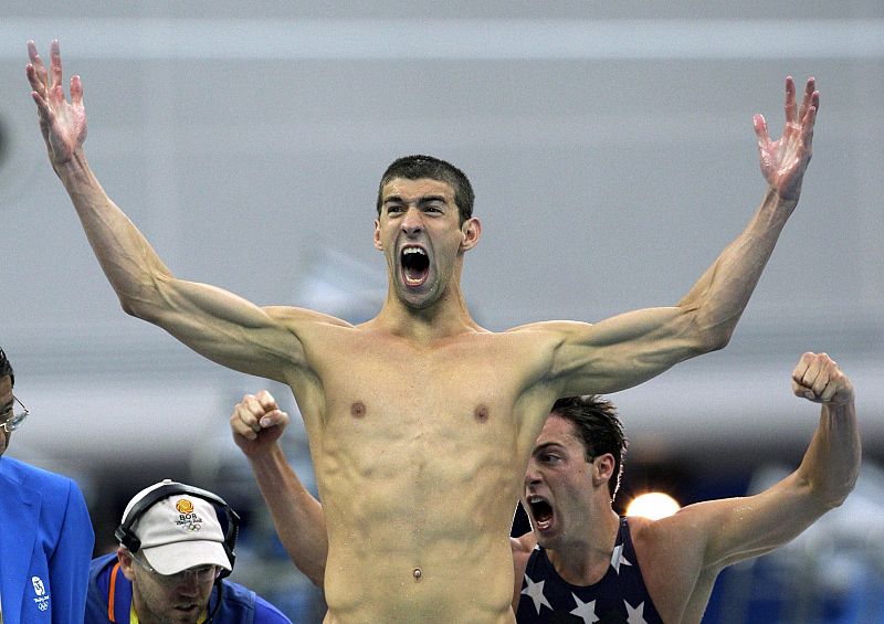 Phelps and Weber-Gale of the U.S. celebrate after winning the men's 4x100m freestyle relay swimming final at the Beijing 2008 Olympic Games