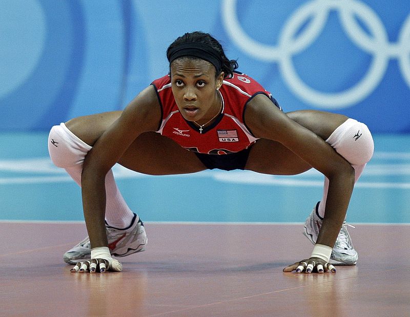 Glass of the U.S. prepares to receive the ball during their women's preliminary pool A volleyball match against Venezuela at the Beijing 2008 Olympic Games