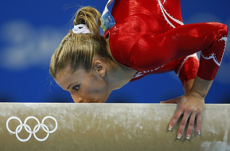 Alicia Sacramone of the U.S. competes on the balance beam in the women's team artistic gymnastics final at the Beijing 2008 Olympic Games