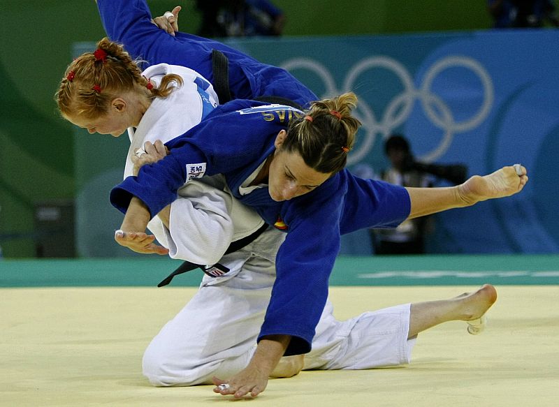 Boehm of Germany fights with Iglesias of Spain during their women's -70kg preliminary judo match at the Beijing 2008 Olympic Games