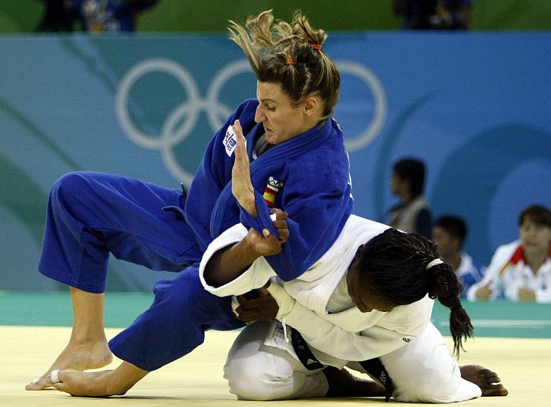 Iglesias of Spain fights with Emane of France during their women's -70kg preliminary judo match at the Beijing 2008 Olympic Games