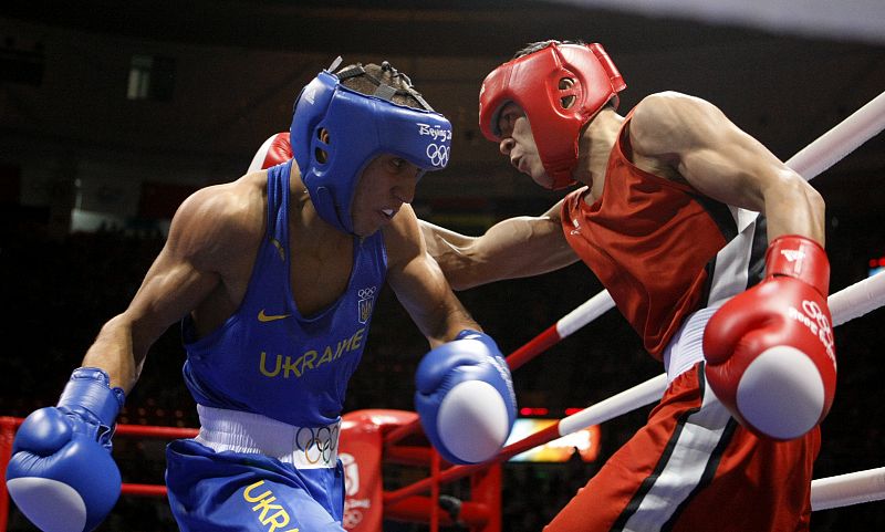 Sultonov of Uzbekistan fights Lomachenko of Ukraine during their men's featherweight (57kg) round of 16 boxing match at the Beijing 2008 Olympic Games