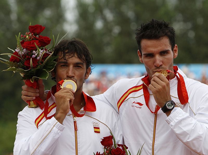 Gold medallists Craviotto and Perez of Spain celebrate their win in the men's kayak double (K2) 500m final at the Beijing 2008 Olympic Games