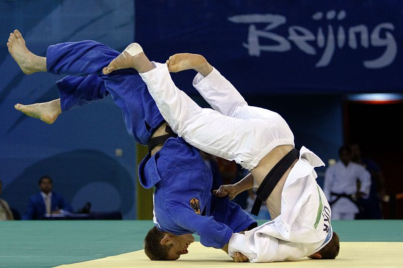 Bischof of Germany fights with Gontiuk of Ukraine during their men's -81kg final of the table judo match at the Beijing 2008 Olympic Games