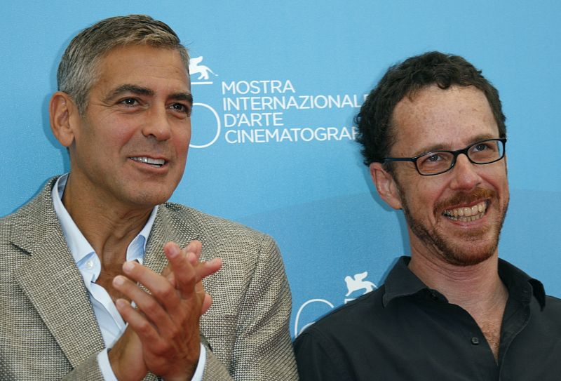 U.S. actor Clooney poses with director Coen during a photocall in Venice