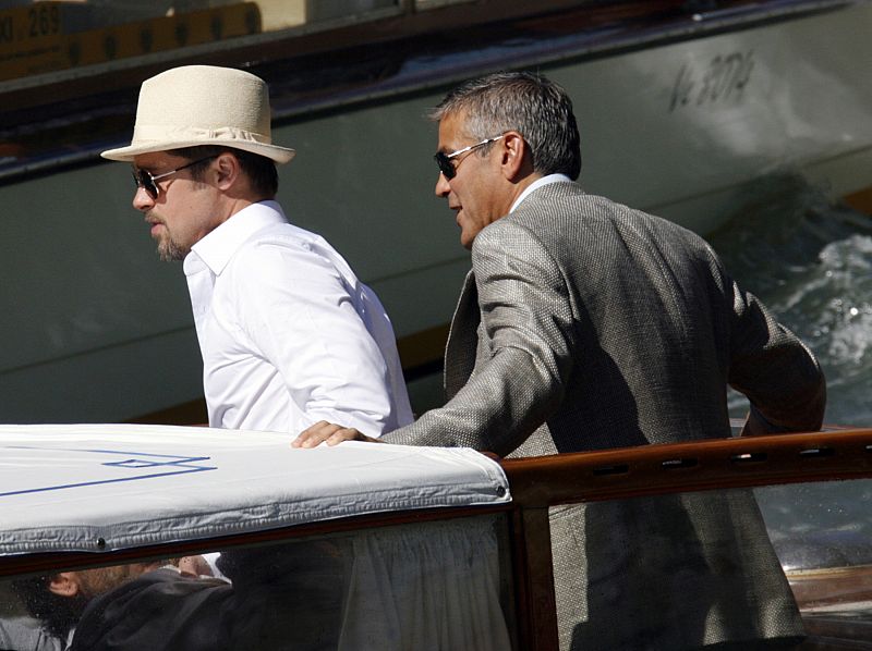 U.S. actor Clooney and Pitt arrive by boat to the Cinema Palace in Venice