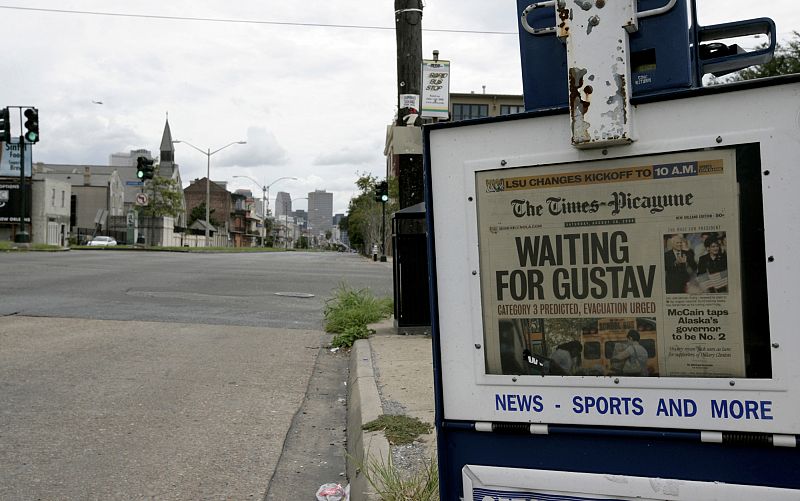 A copy of The Times-Picayune is displayed on a deserted downtown street after the evacuation of New Orleans