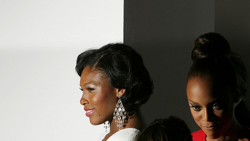 Tennis player Serena Williams and model Tyra Banks wait for the start of the Calvin Klein Spring 2009 show in New York