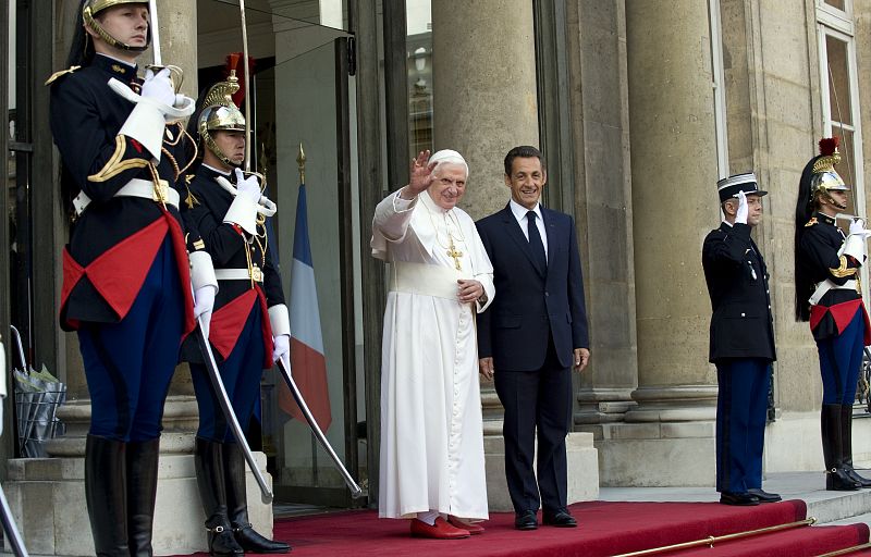 France's President Sarkozy stands with Pope Benedict XVI at the Elysee Palace in Paris