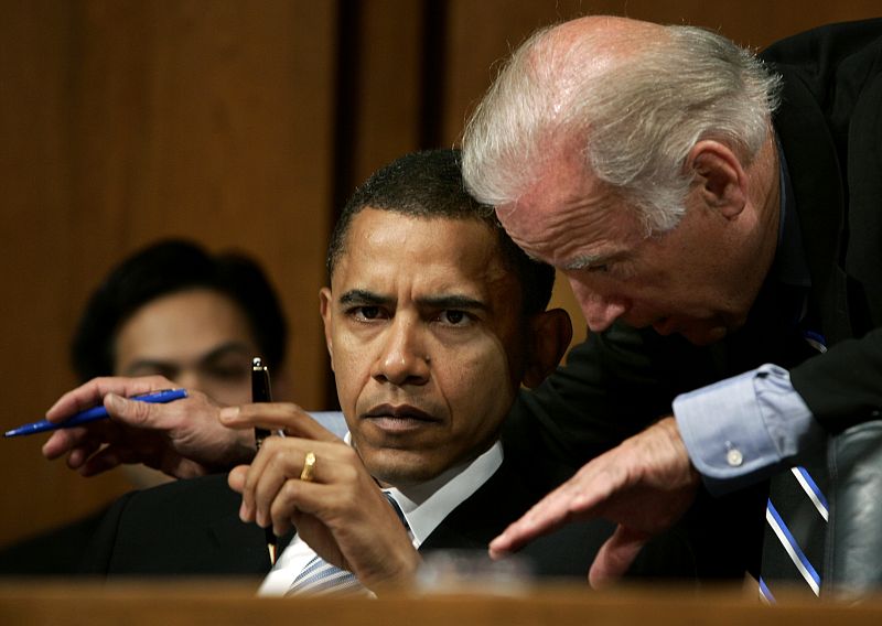 Senators Biden and Obama discuss the nomination of Bolton at a hearing in Washington.