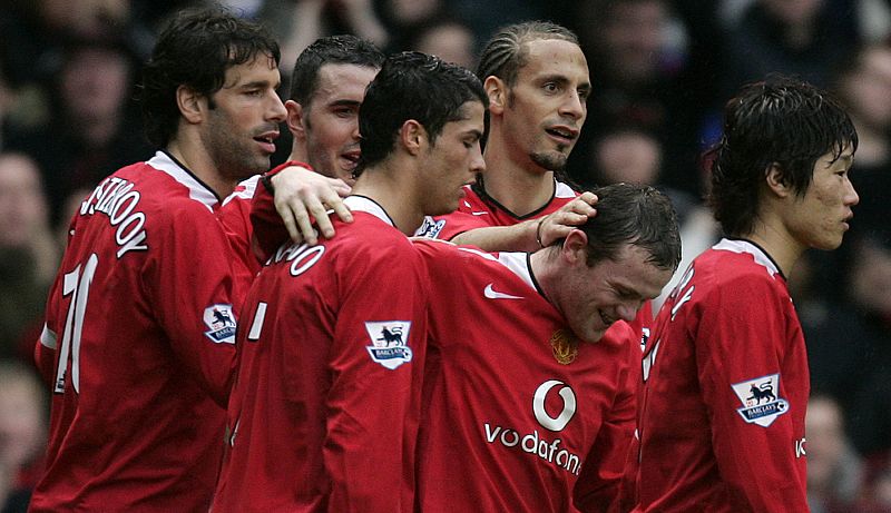 Manchester United's Rooney celebrates with team mates after scoring against Birmingham City during English Premier League match in Manchester