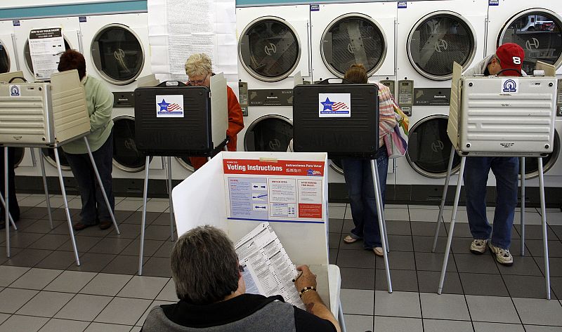 Voters cast ballots in a laundromat on election day in Chicago