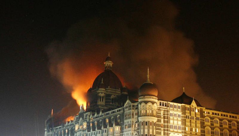 Smoke rises from the Taj Hotel in Mumbai