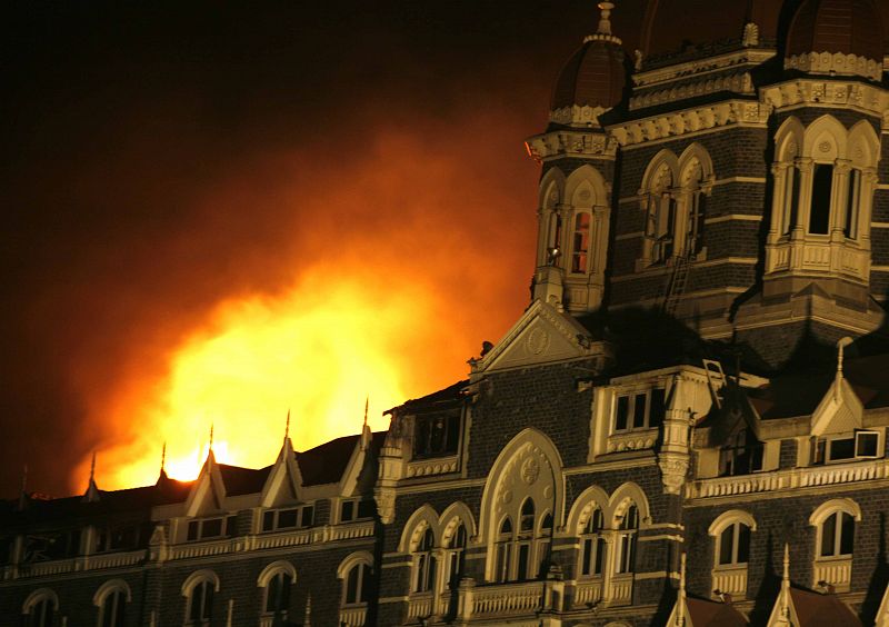 Smoke and fire billows out of the Taj Hotel in Mumbai