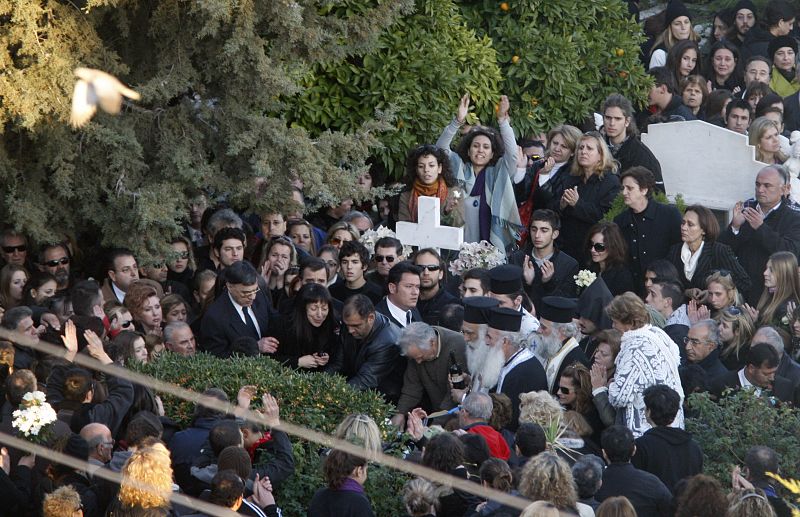 Mourners attend the funeral of Alexandros Grigoropoulos in Athens