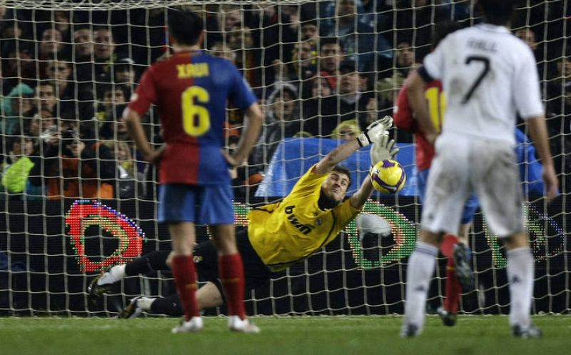 Real Madrid's goalkeeper Casillas saves penalty shot during their Spanish First Division soccer match in Barcelona