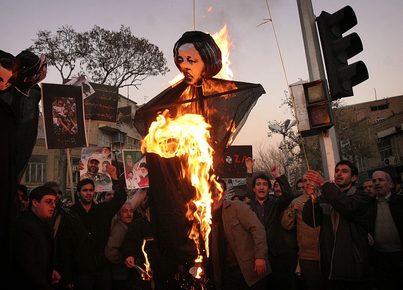 Demonstrators shout slogans during a protest against Israeli attacks on Gaza, in Madrid