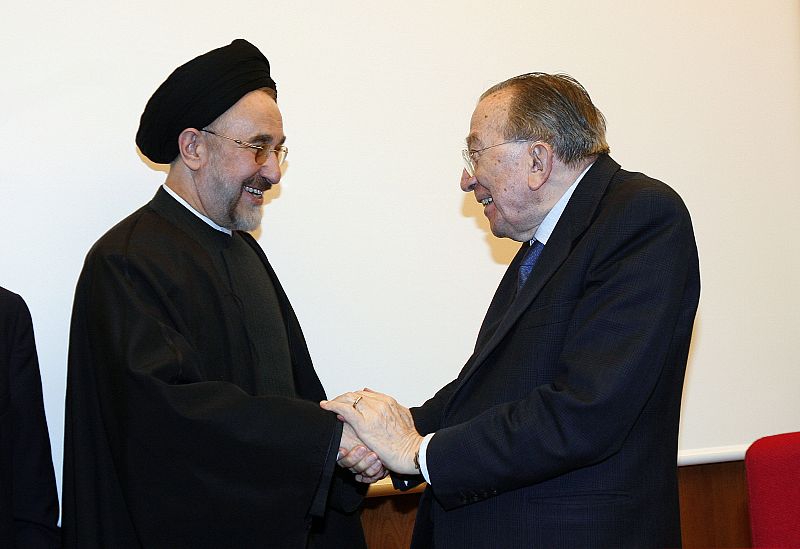 Former Iranian President Khatami shakes hands with former Italian Premier Andreotti in Rome