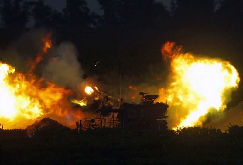 Israeli mobile artillery unit fires shell from position outside northern Gaza Strip