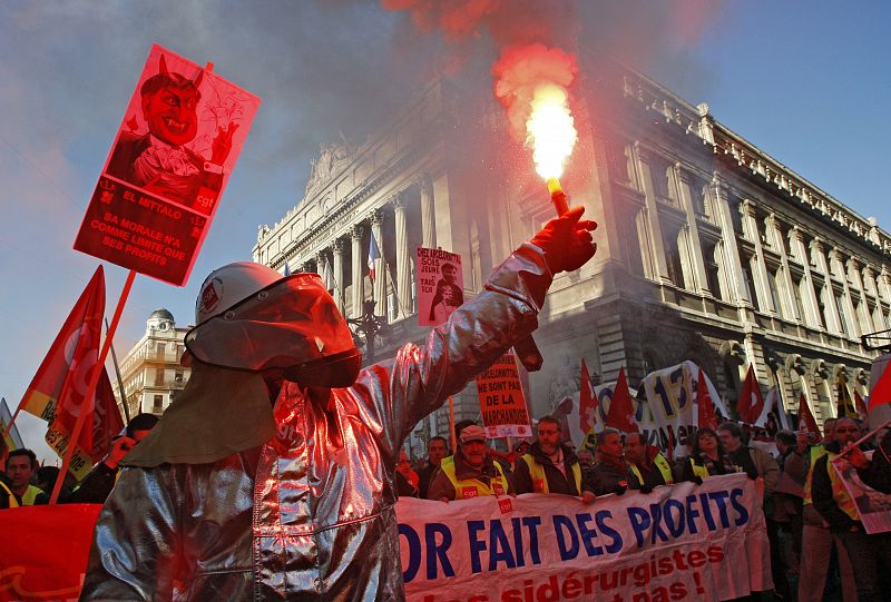 Arcelor Mittal steel workers demonstrate during a protest march in Marseille