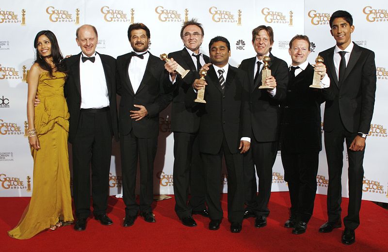 The cast and crew of the Best Motion Picture - Drama "Slumdog Millionaire"  pose with their Golden Globe awards in Beverly Hills