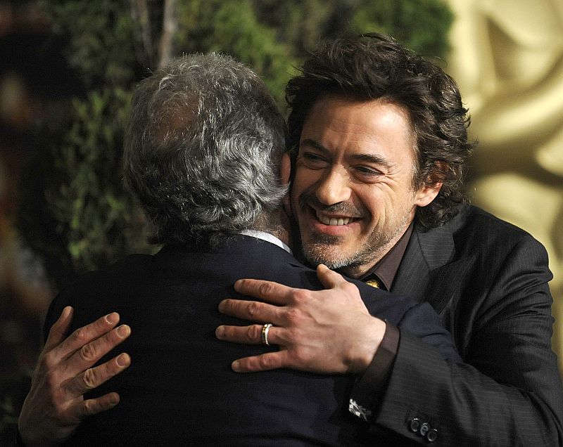 Robert Downey Jr hugs AMPAS President Sid Ganis at the nominees luncheon for the 81st annual Academy Awards in Beverly Hills