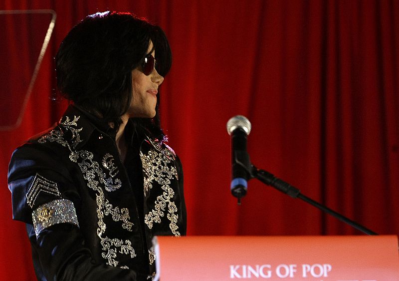 U.S. pop star Michael Jackson arrives for a news conference at the O2 Arena in London