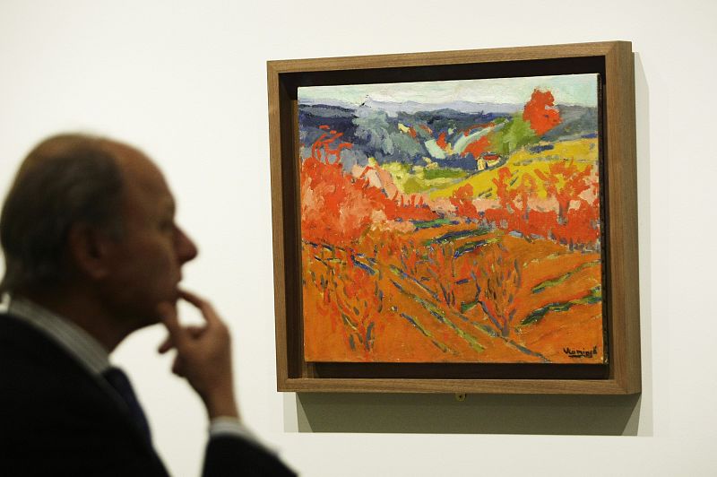 Man attends media presentation of exhibition "Maurice de Vlaminck, a Fauve Instinct" at Madrid's Caixa Forum museum