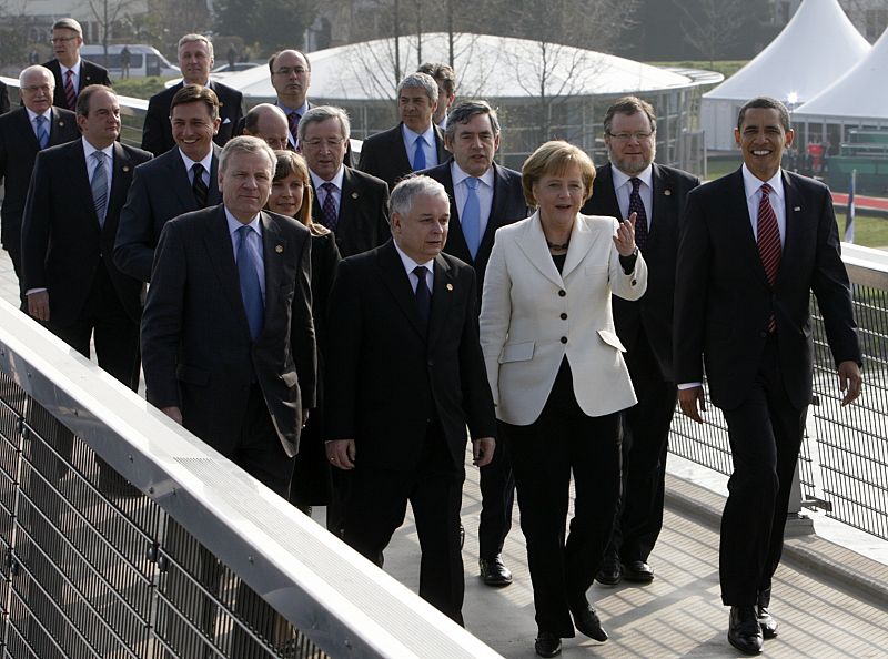 NATO heads of state and government walk on the "Two Banks Bridge" on the Rhine river in Kehl