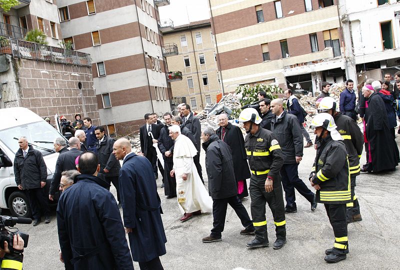 Pope Benedict XVI leaves after visiting the collapsed university dorm building known as the 'Casa dello Studente' in Aquila