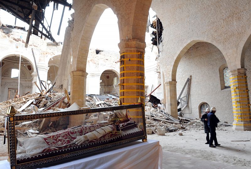 The relic of Pope Celestino V is seen inside of the a urn  where  Pope Benedict XVI putted a stole white reminiscent of the papal visit at St. Maria of Collemaggio church in L'Aquila