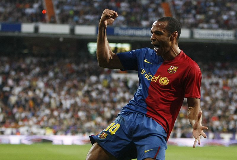Barcelona's Thierry Henry celebrates his goal against Real Madrid during their Spanish first division soccer match at Santiago Bernabeu stadium in Madrid