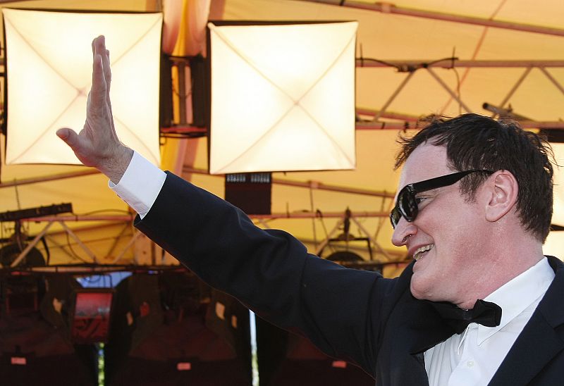 Director Tarantino poses during red carpet arrivals for the film "Kinatay" at the 62nd Cannes Film Festival