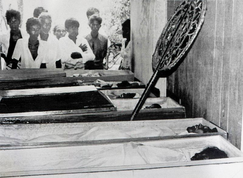 Bodies of fifteen villagers killed by Tamil guerrillas are in coffins in Sri Lanka