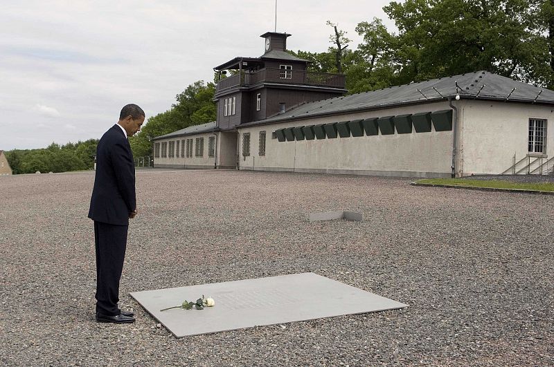 U.S. President Obama places a rose in memory of survivors at the Buchenwald Concentration Camp in Germany